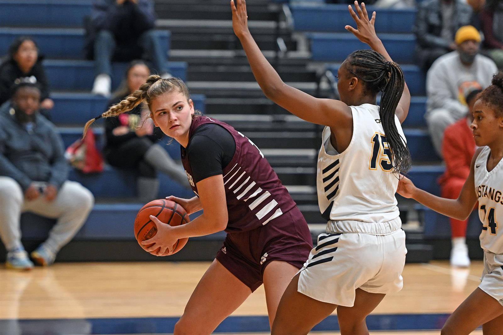 Cy-Fair High School senior Anna Farrell, left, earned first-team honors on the All-District 17-6A girls’ basketball team.